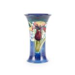 WILLIAM MOORCROFT (BRITISH 1872-1945) FOR MOORCROFT POTTERY 'ORCHID AND SPRING FLOWERS' VASE, CIR