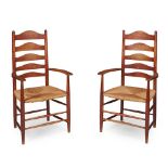 ERNEST GIMSON (BRITISH 1864-1919) PAIR OF LADDERBACK ARMCHAIRS