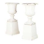PAIR OF PAINTED CAST IRON GARDEN URNS AND PEDESTALS LATE 19TH CENTURY