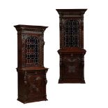 PAIR OF CAROLEAN STYLE CARVED OAK AND STAINED-GLASS BOOKCASE CABINETS 19TH CENTURY