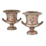 A pair of silver-plated wine coolers