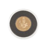 A commemorative gold piedfort £1 coin