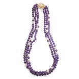 An amethyst, pearl and diamond necklace