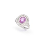 A pink sapphire and diamond target cluster ring