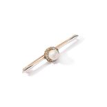 An early 20th century pearl and diamond bar brooch