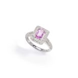 A pink sapphire and diamond ring