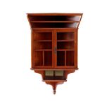 E. W. GODWIN (1833-1886), PROBABLY MADE BY WILLIAM WATT AESTHETIC MOVEMENT HANGING CORNER CABINET,