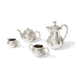 CHINESE EXPORT SILVER THREE-PIECE TEA SERVICE AND A COFFEE POT CIRCA 1920