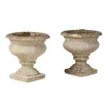 PAIR OF SMALL COMPOSITION STONE GARDEN URNS MODERN