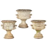 SET OF THREE COMPOSITION STONE GARDEN URNS MODERN