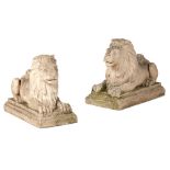 PAIR OF PAINTED COMPOSITION STONE RECUMBENT LIONS MODERN