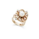 A cultured pearl and diamond cluster ring