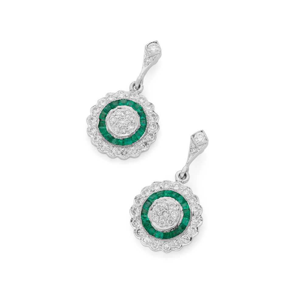 A pair of emerald and diamond pendent earrings