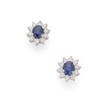 A pair of sapphire and diamond cluster earrings