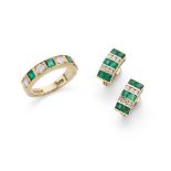 An emerald and diamond ring and matching earrings