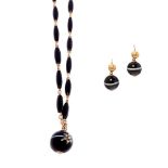 A mid 19th century onyx and agate necklace and earrings