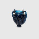 ANCIENT SASSANID MINIATURE BLUE GLASS BOTTLE NEAR EAST, FIRST HALF OF THE FIRST MILLENNIUM A.D.