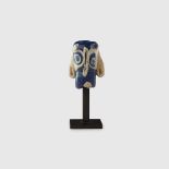 PHOENICIAN JANIFORM COMIC FACE PENDANT NEAR EAST, 600 - 400 B.C.