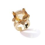 A citrine and diamond ring