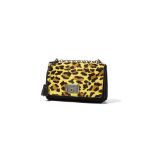 Prada: A yellow leopard print bag