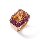A citrine and ruby dress ring