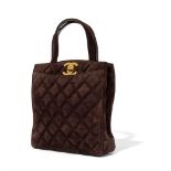 Chanel: A brown suede tote