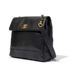 Chanel: A black caviar CC shoulder bag