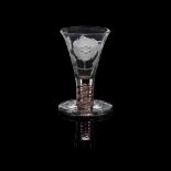 JACOBITE SODA FIRING GLASS WITH RARE COLOUR TWIST STEM 18TH CENTURY