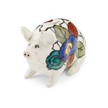 A LANGTOUN WARE MONEY BOX PIG EARLY 20TH CENTURY