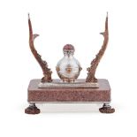 A VICTORIAN GRANITE AND ANTLER MOUNTED INKWELL