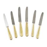 A RARE SUITE OF TWENTY-FOUR GEORGE III SCOTTISH SILVER GILT TABLE AND DESSERT KNIVES DAVID MARSHALL,