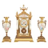 FRENCH GILT BRONZE AND PORCELAIN THREE PIECE CLOCK GARNITURE LATE 19TH/ EARLY 20TH CENTURY