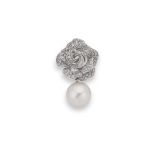 A pearl and diamond pendant