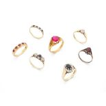 A collection of seven gem-set rings