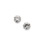 A pair of diamond stud earrings