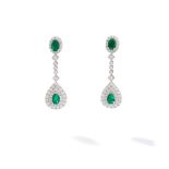 A pair of emerald and pendent diamond earrings