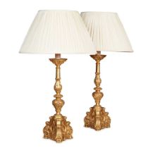 PAIR OF CARVED GILTWOOD PRICKET STICK TABLE LAMPS 20TH CENTURY