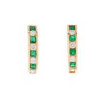 A pair of emerald and diamond clip earrings