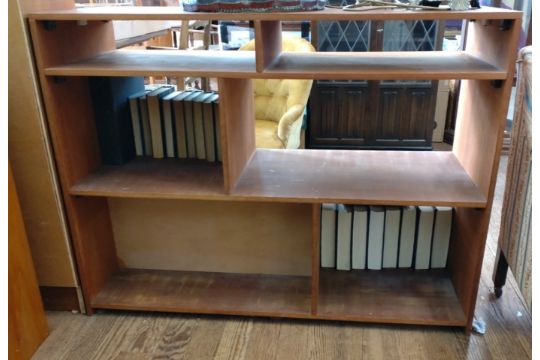 A low, wide bookcase, approx. 94cm x 123cm x 46cm