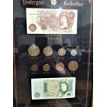 A yesteryear coin collection in glazed frame. Silver threepence 1551-1944, 10 shilling note 1961-
