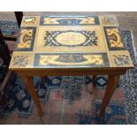 Musical table with marquetry inlay, opens to reveal wooden sections. 43cm x 37cm x 28cm.