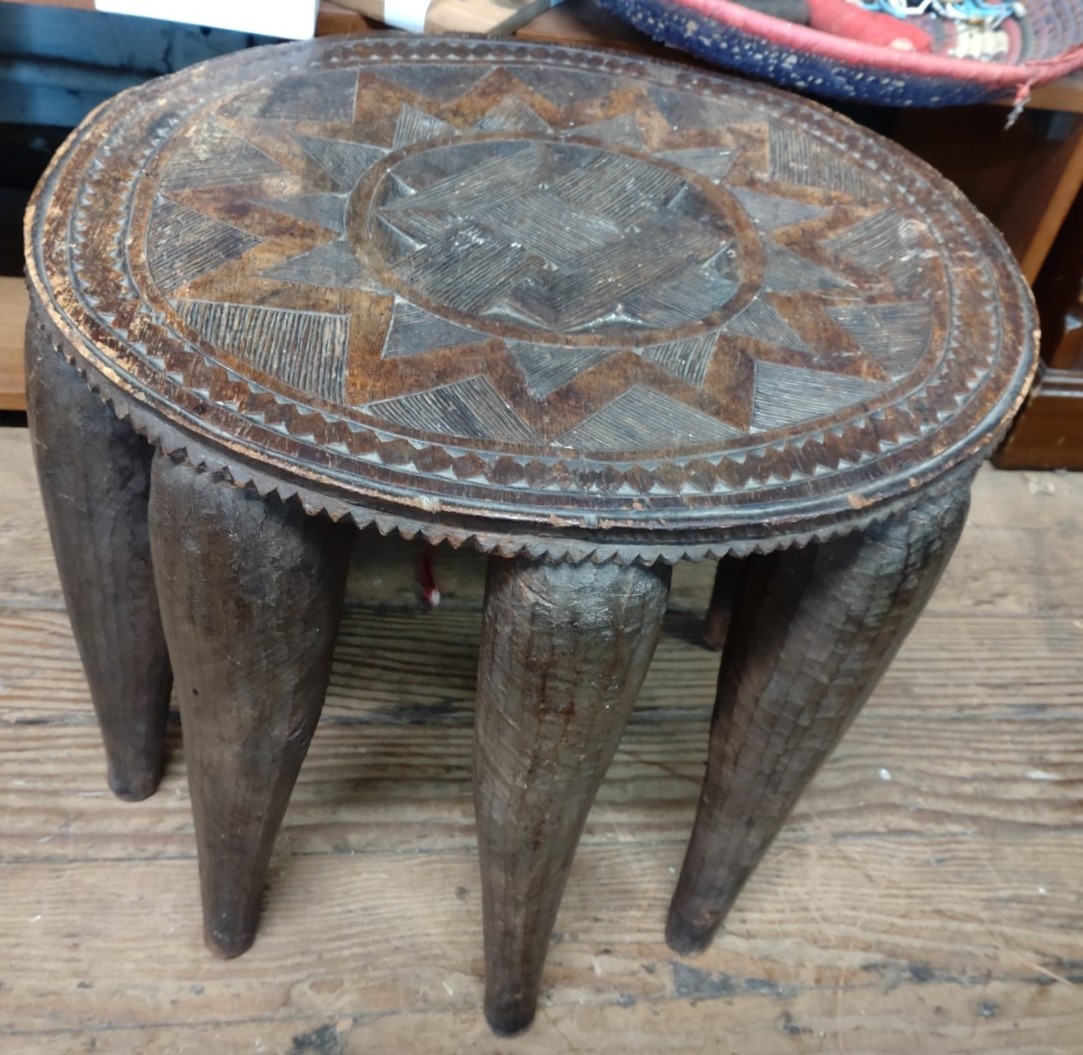 A Middle-Eastern ten-legged circular table 42cm diameter, two drums, a folding stool, two - Image 2 of 2