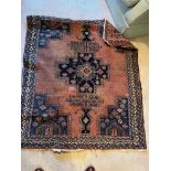 An Afghan Rug. approx. 111cm x 134cm.