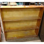 A small bookcase, each shelf gradually larger in depth towards the bottom. Approx. 90cm x 92cm x