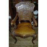 Vintage Oriental chair with carved back, arms and legs