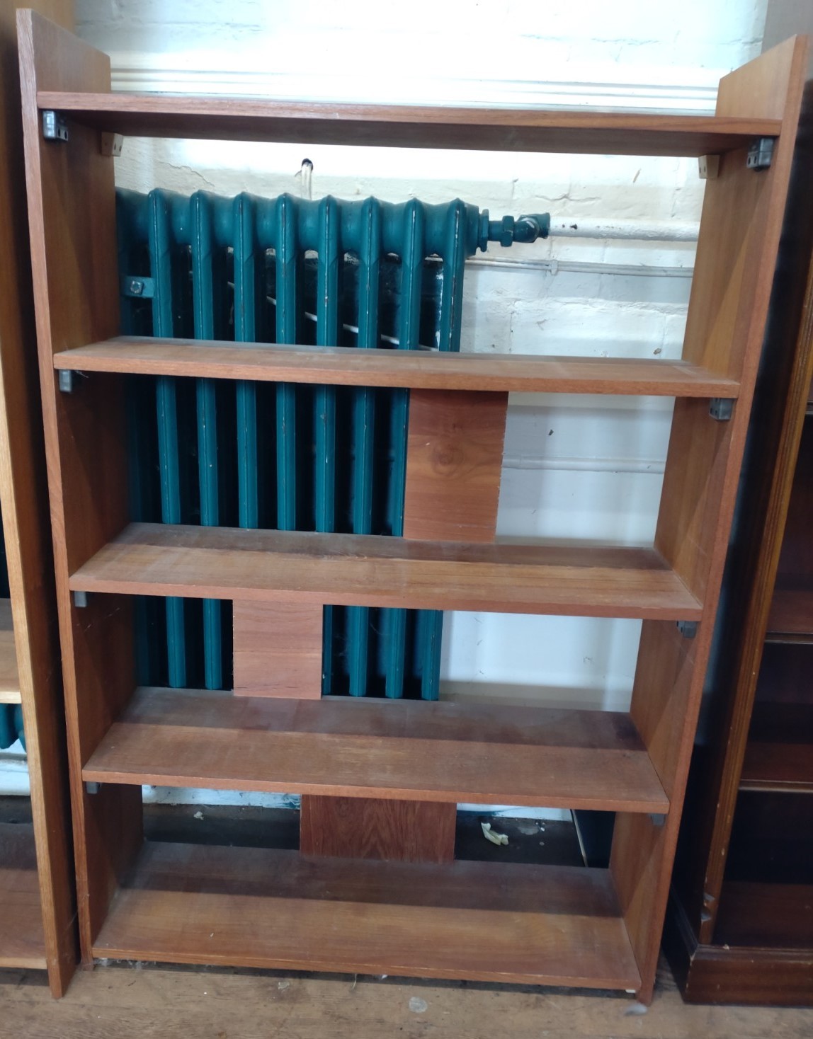 A small bookcase, approx. 122cm x 80cm x 26cm