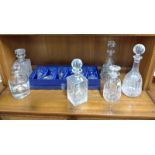 A set of six Royal Doulton wine glasses in original blue lidded box, and six various decanters