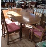 Ercol extending dining table and 6 chairs (two of which are carvers). 74cm x 210cm extended (161cm