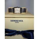 A ladies' stainless steel wristwatch by Raymond Weil with box and papers.