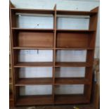 A tall double open bookcase. Approx. 184cm x 144cm x 31cm